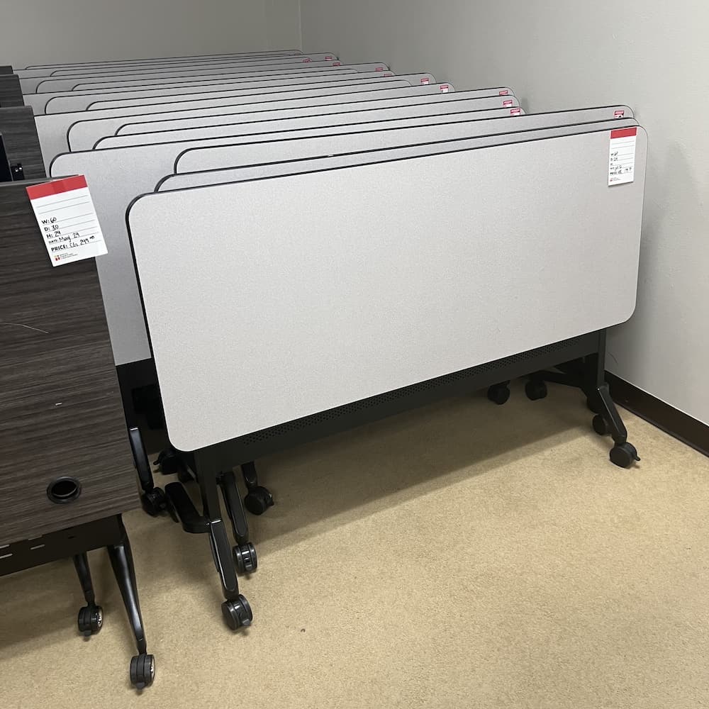 grey laminate training table with black base and edging. Flip, nest roll