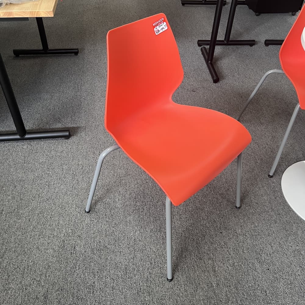 orange plastic stacking bucket chairs, used furniture, dining, break room
