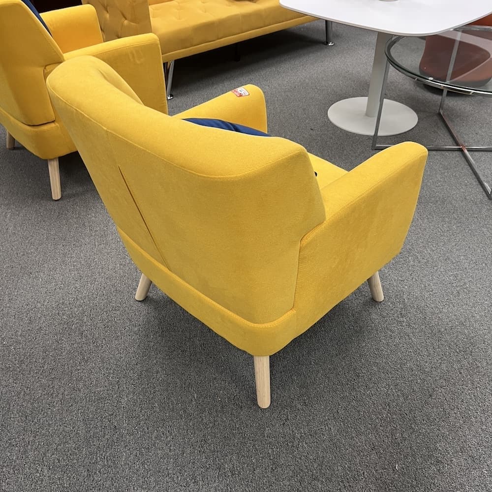 yellow upholstered lounge chair, used home and office furniture