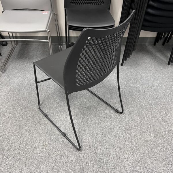 black plastic stacking chair, molded, used office furniture, used seating