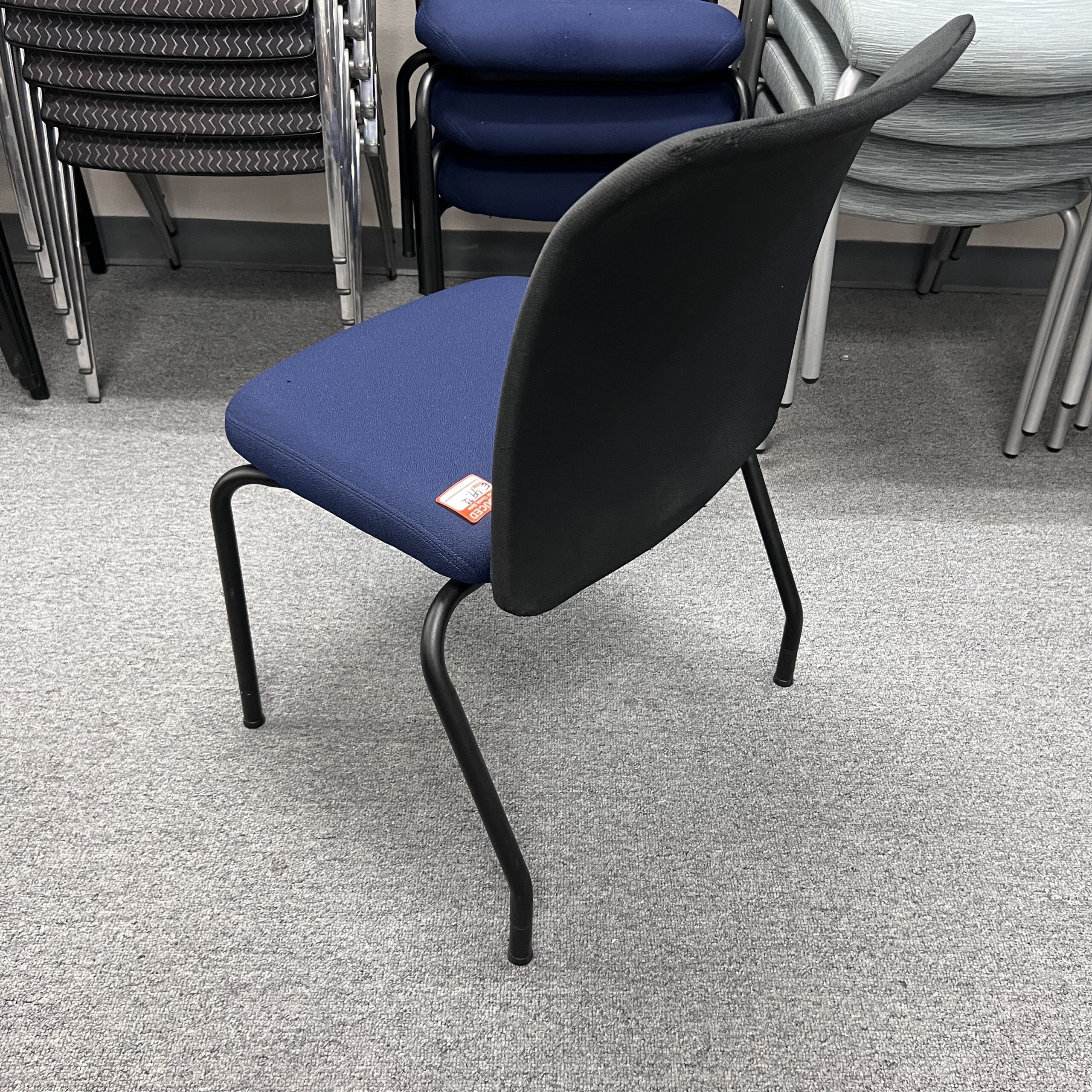 blue upholstered and black stacking chair, Paoli brand, used seating, used office furniture