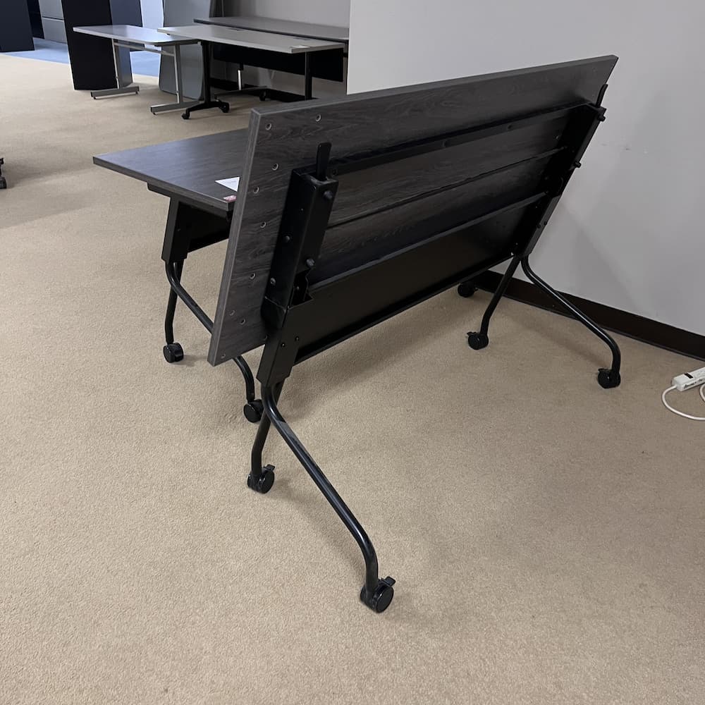 60x24 grey laminate training table with black base, flip, fold nest, used office furniture desk break room