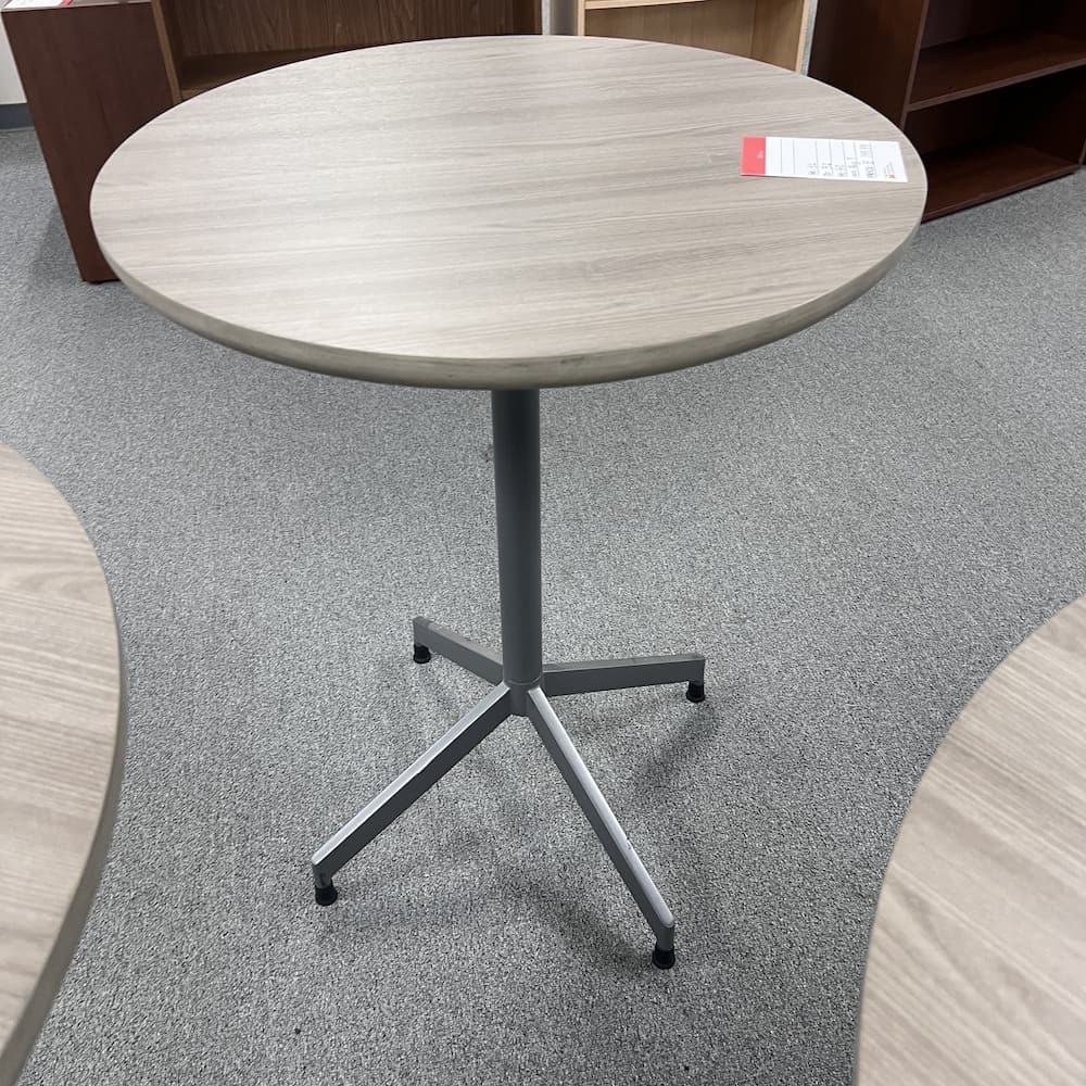 grey taupe round top with metal grey base, pub table, bar height table, 32", used furniture