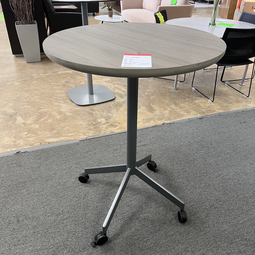 grey taupe round top with metal grey rolling base, pub table, bar height table, 32", used furniture