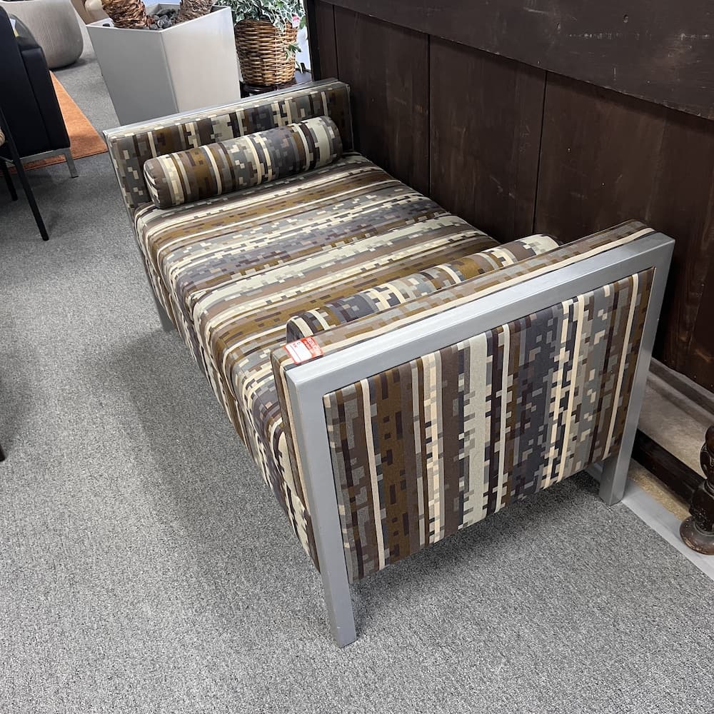 brown and copper and silver upholstered bench with metal sides, square patter with round cylindrical pillows, Paoli brand, commercial furniture, used office furniture, lounge reception area