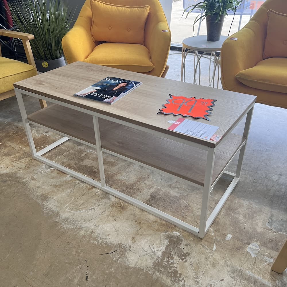 oak laminate and white metal rectangle coffee table and lower shelf. Used home furniture
