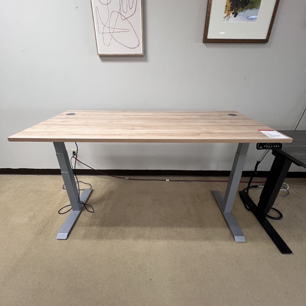 aspen laminate height adjustable desk 66x30 with silver base and silver grommets, standing electrical, used office furniture