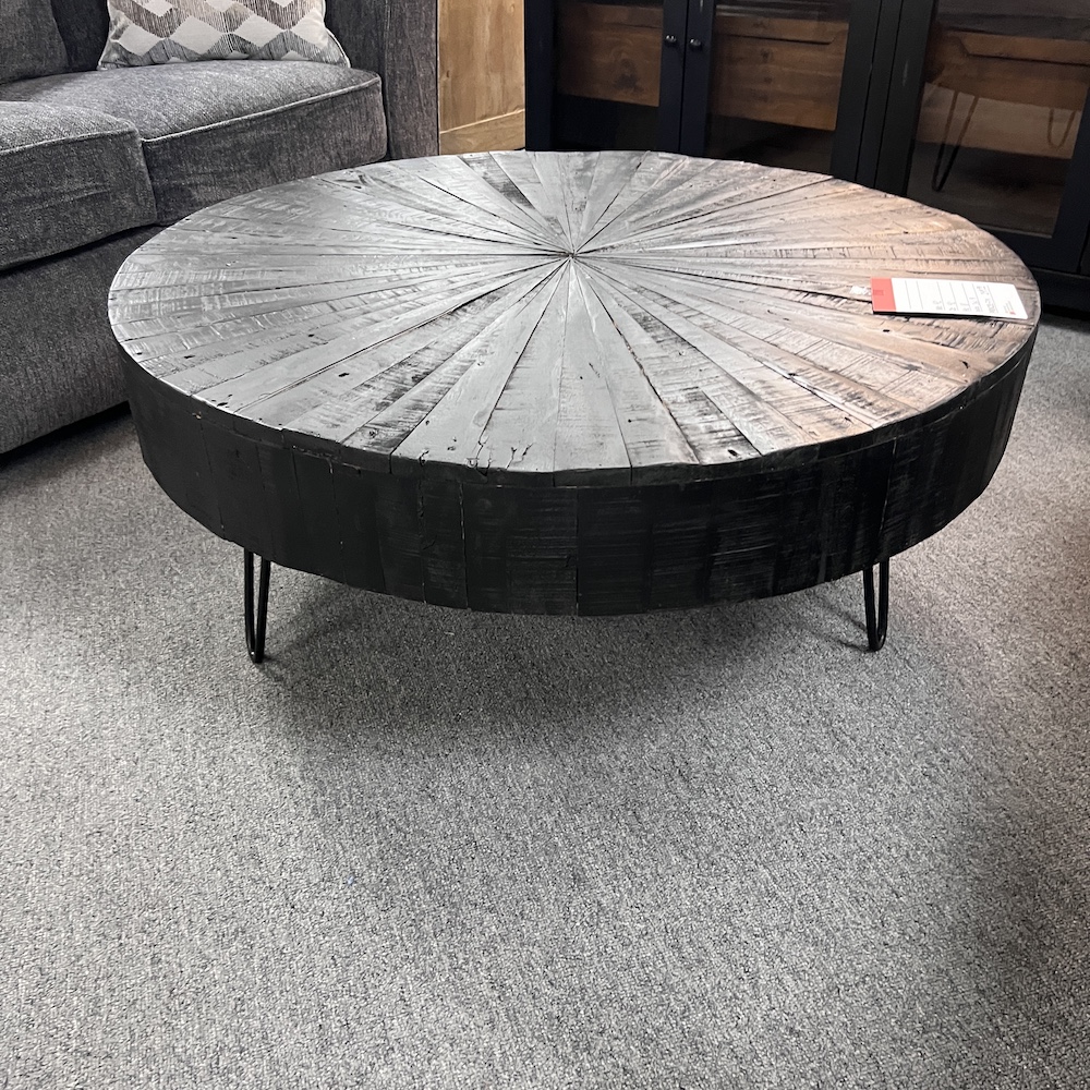 black distressed round wood coffee table with hairpin legs