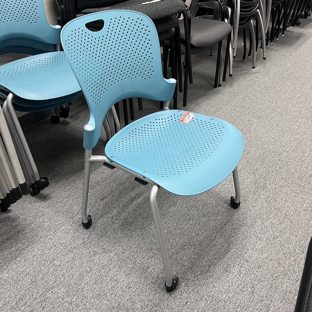 blue aqua Herman Miller caper stacking chair, plastic with grey legs, no arms, used office furniture