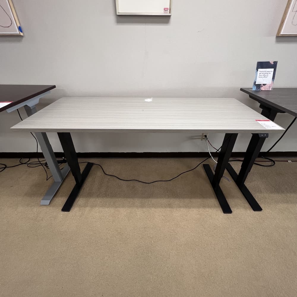light grey laminate height adjustable desk with black back, standing electric desk, used office furniture,