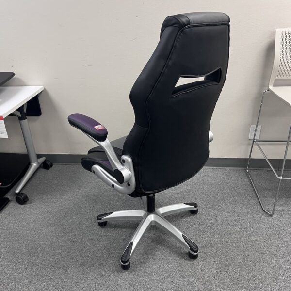 purple black and grey gaming chair with flip up arms, used office furniture