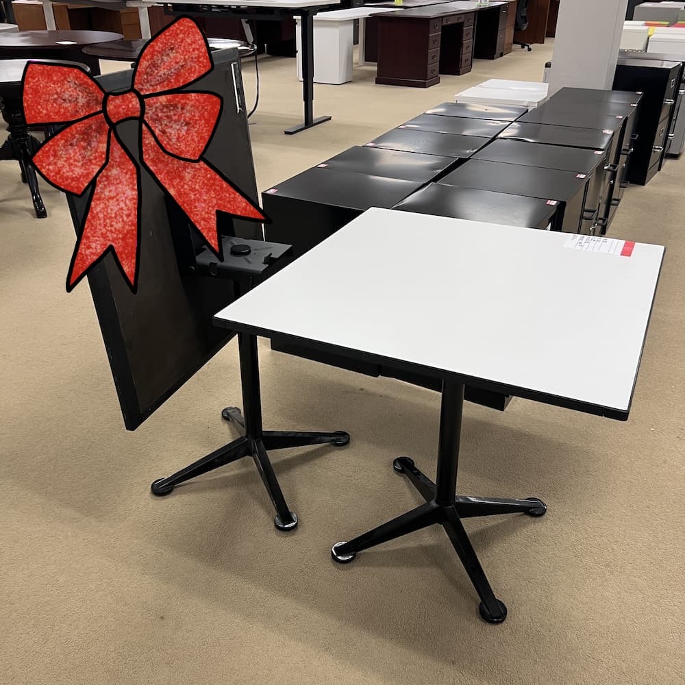 white laminate 30" x 30" flip top cafe table with black base. Used restaurant tables, used office furniture, break room table