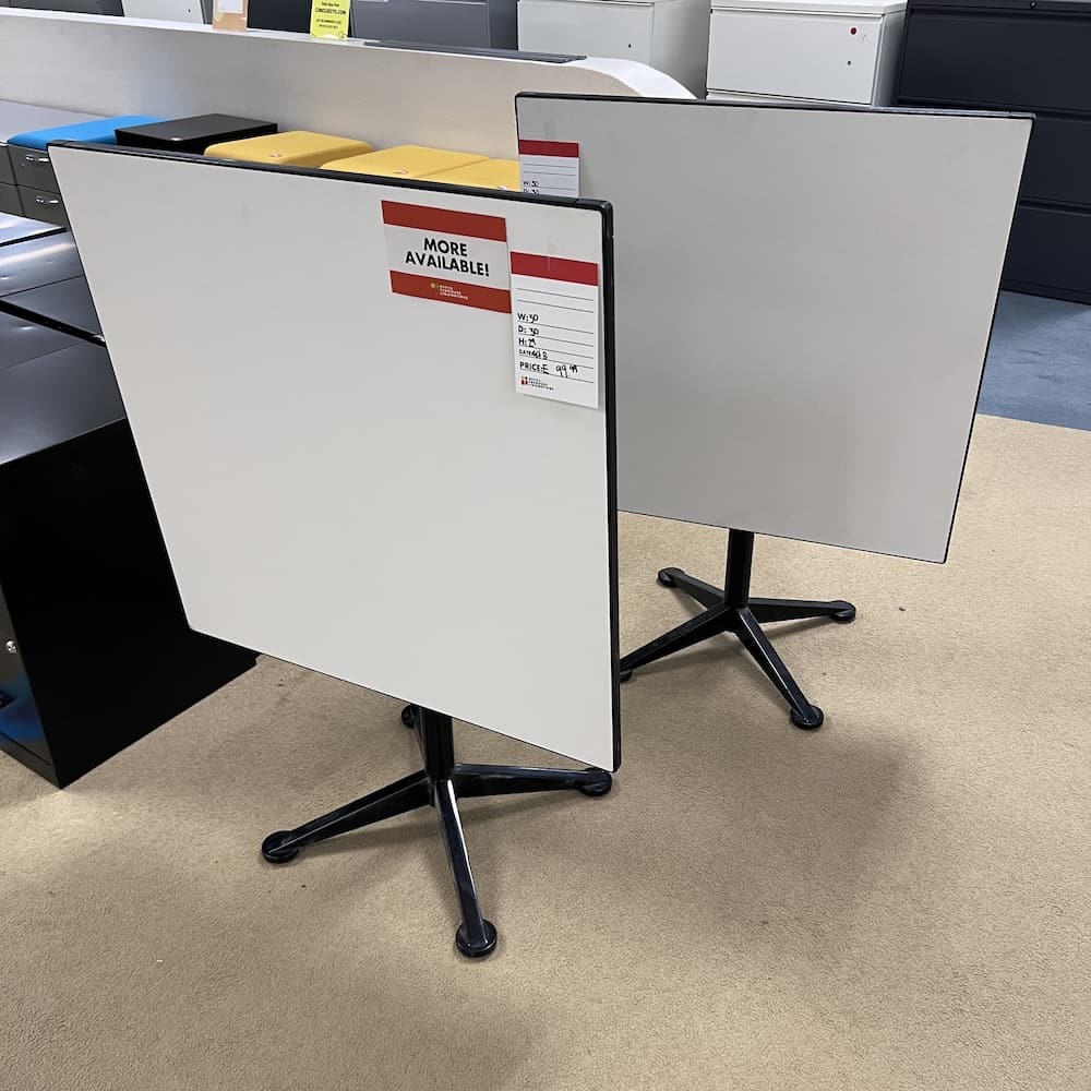 white laminate 30" x 30" flip top cafe table with black base. Used restaurant tables, used office furniture, break room table