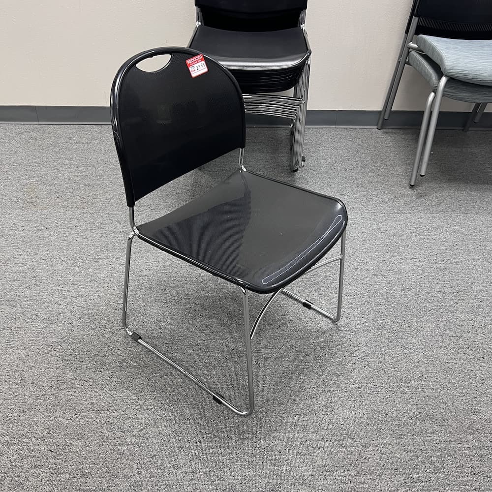black plastic and chrome stacking chair, used office furniture, 880lb Hercules flash furniture