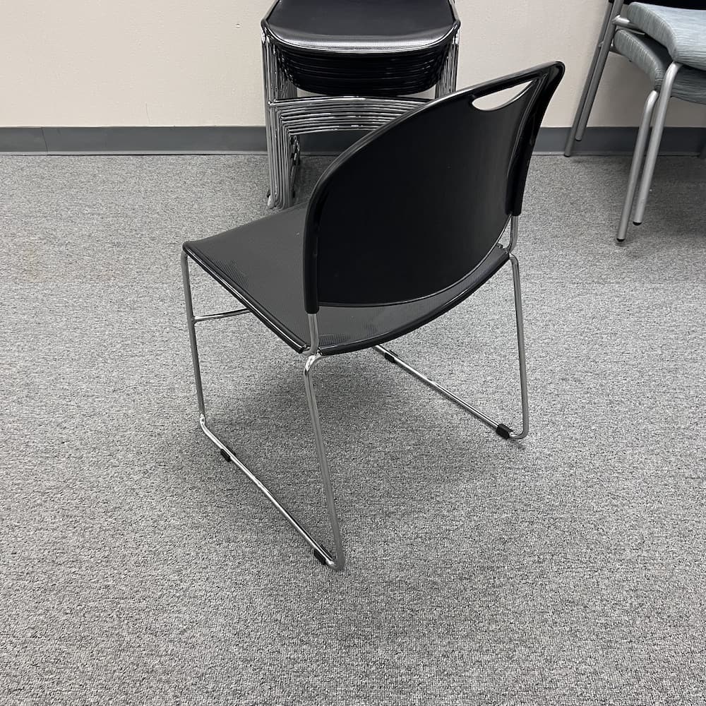 black plastic and chrome stacking chair, used office furniture, 880lb Hercules flash furniture