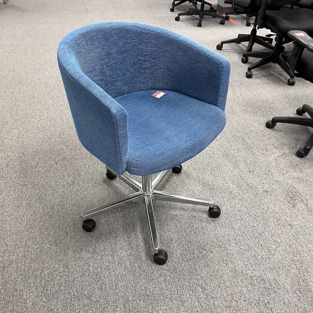 blue upholstered barrel rolling chair on 5 point star, used office furniture