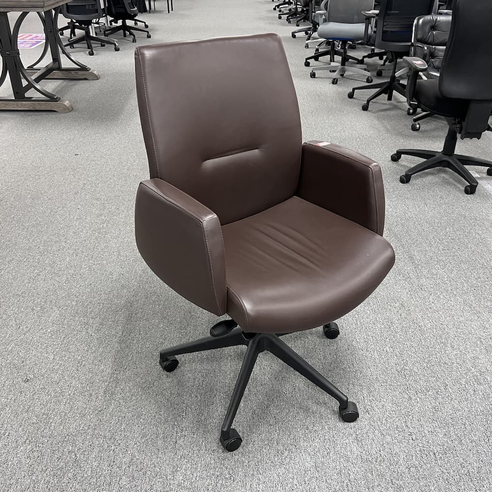 brown vinyl Arcadia adjourn mid back, conference chair, used office furniture