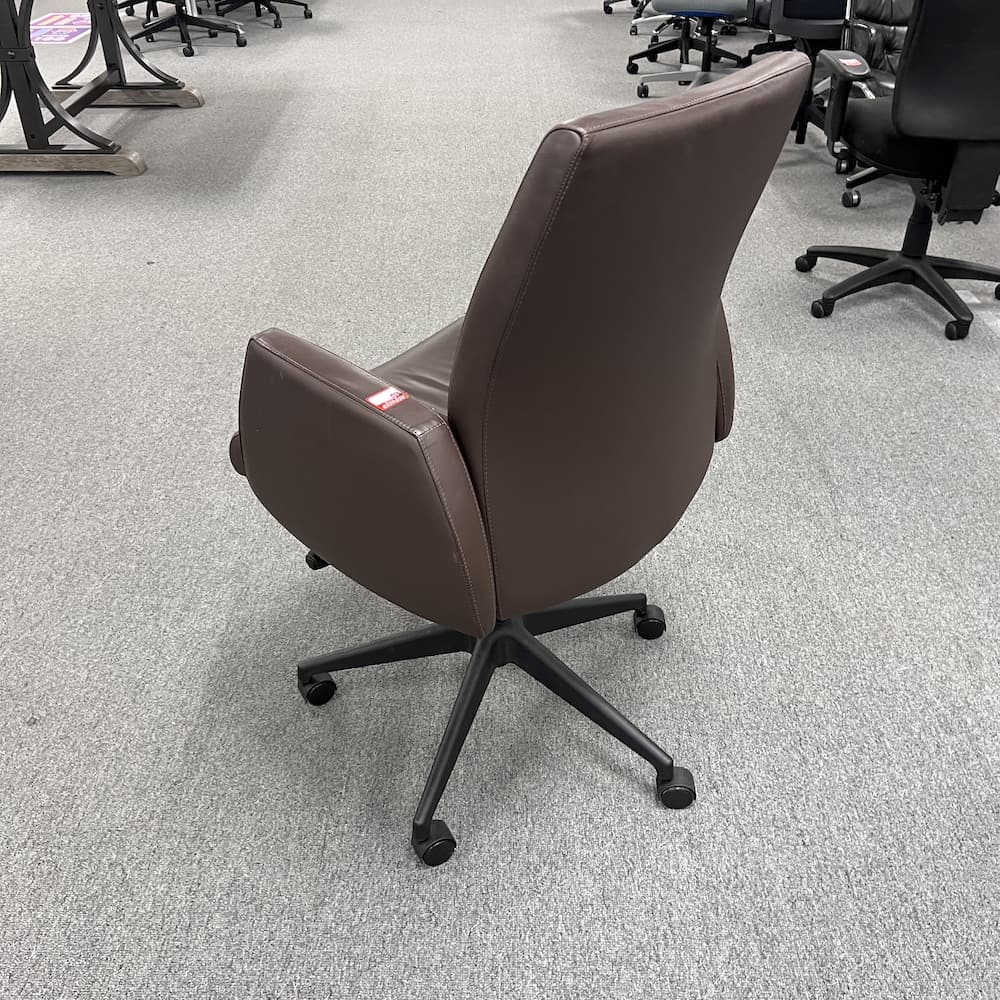 brown vinyl Arcadia adjourn mid back, conference chair, used office furniture