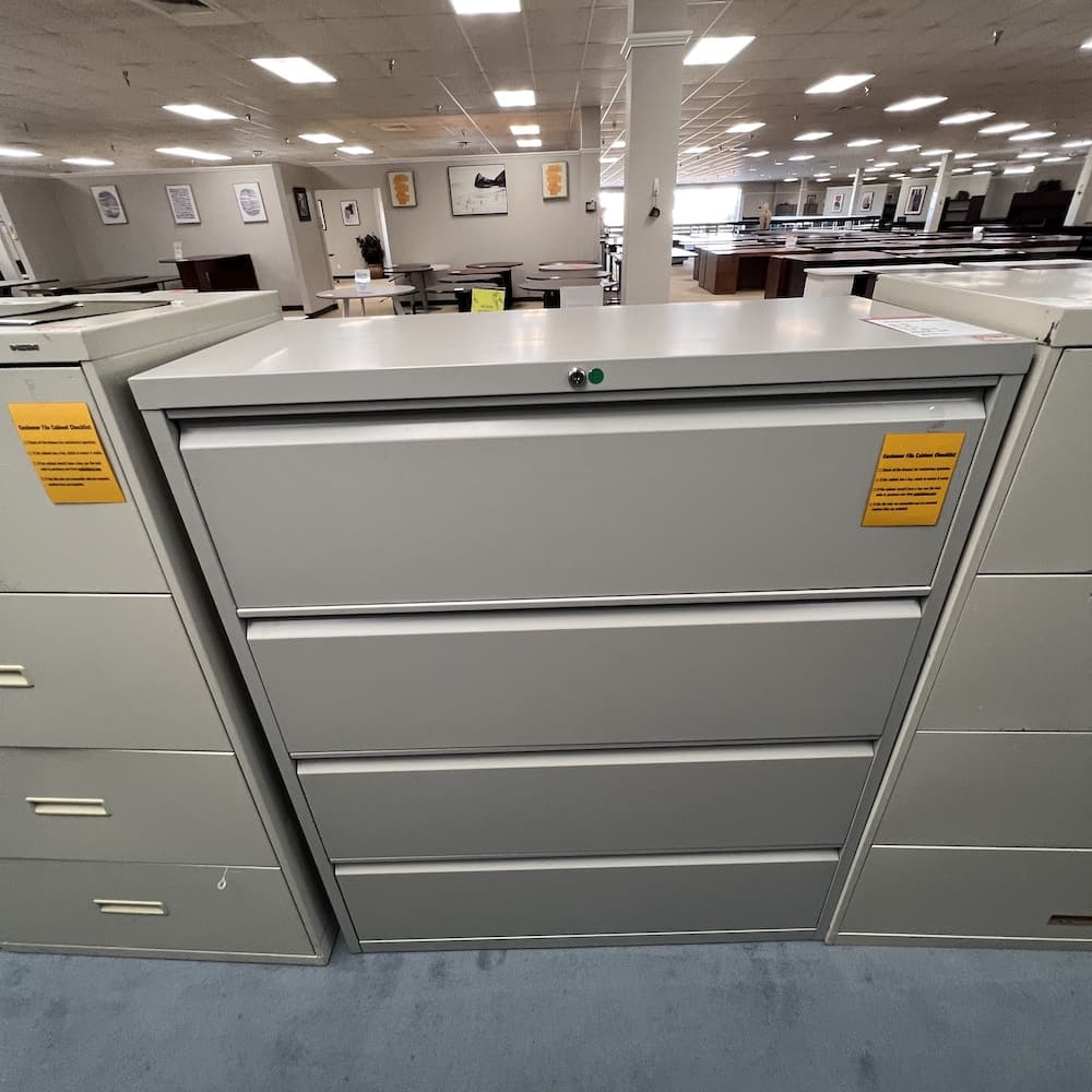 Anderson hickey 4 drawer lateral file in grey metal, used office furniture
