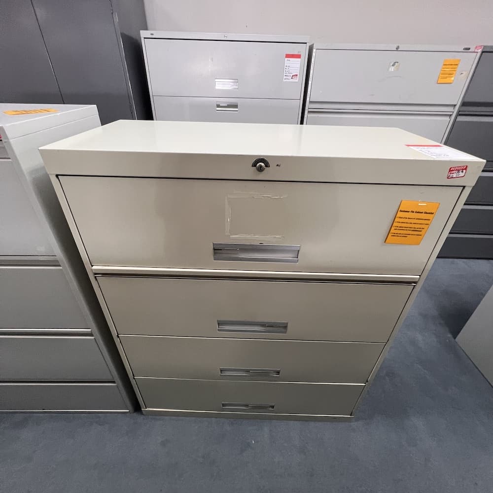 beige metal 4 drawer lateral file, used office furniture