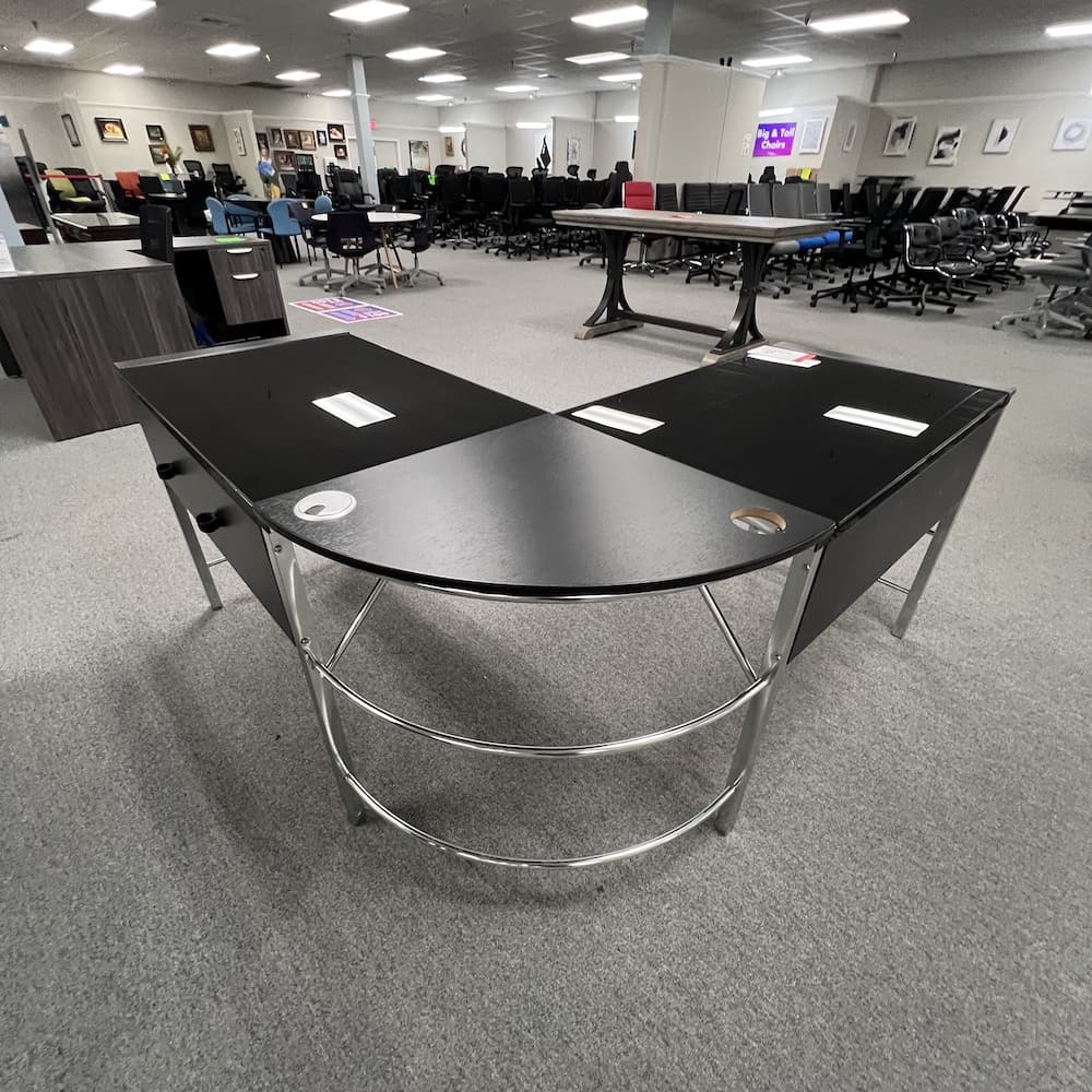 black glass l-desk with chrome accents, used office furniture
