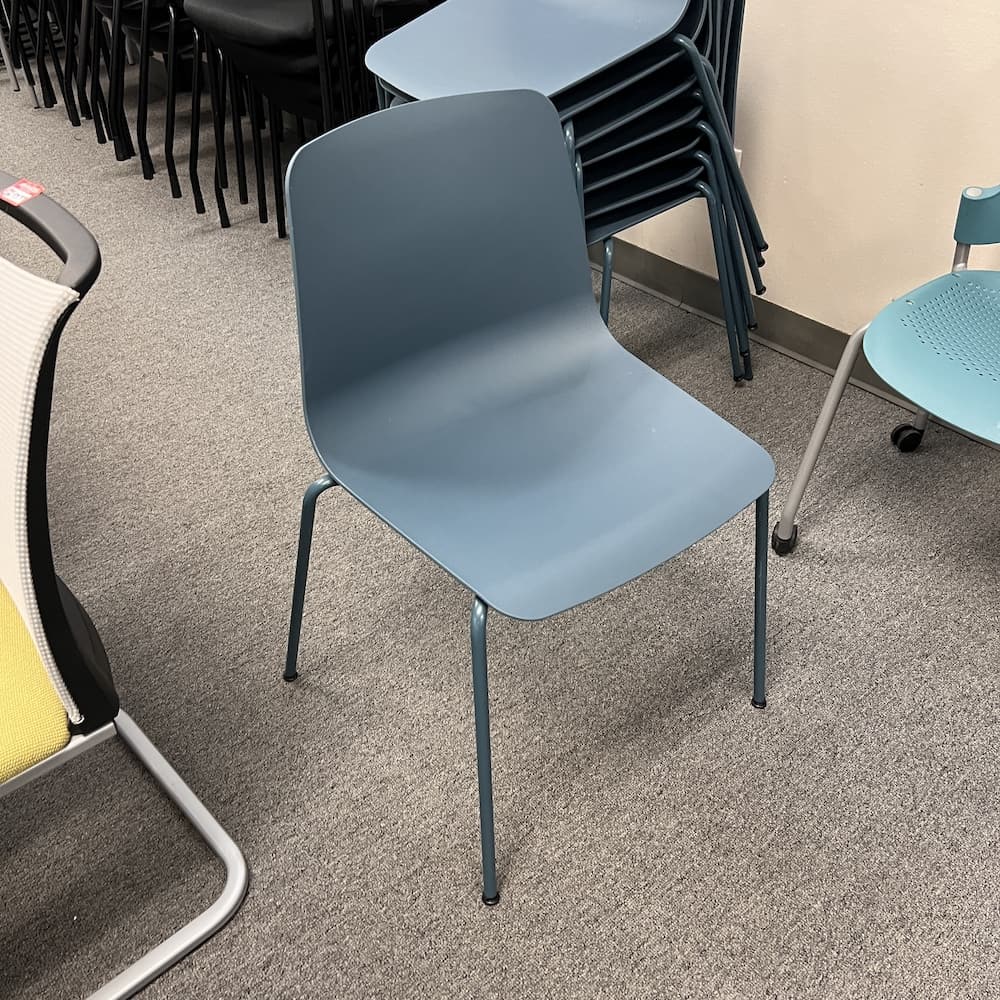teal plastic stacking chair, vary Simon genteelly incase, used office furniture