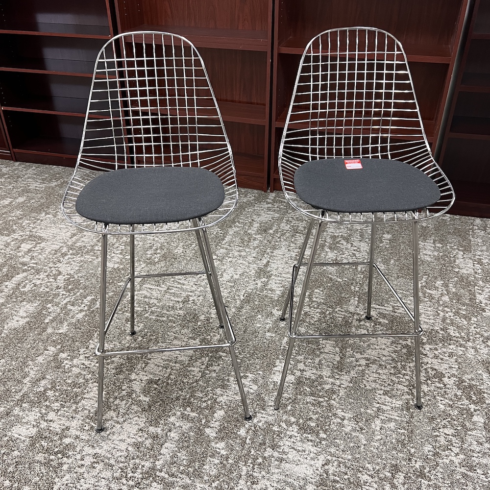 black seat pad and chrome base Herman Miller Eames wire stool, used furniture