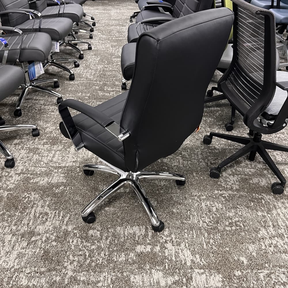 black and chrome mid back rolling conference chair