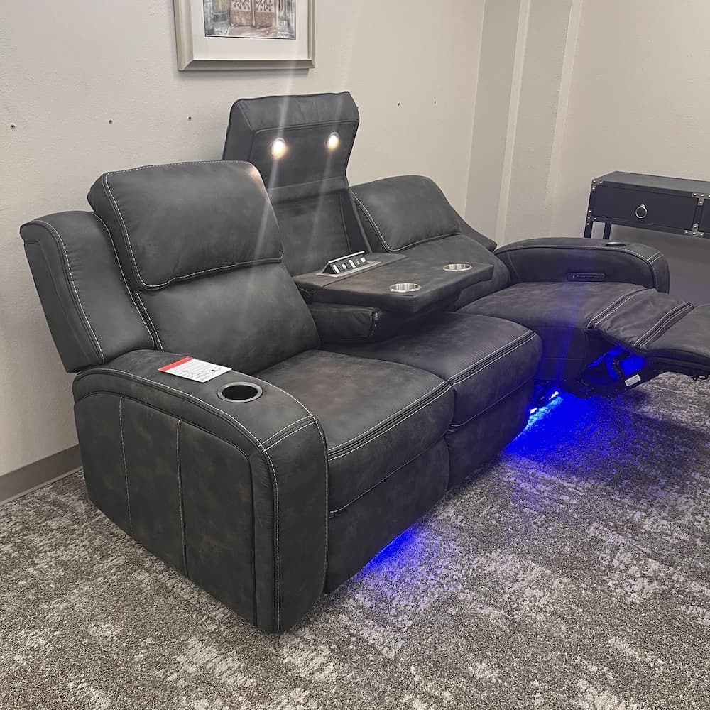 grey faux suede reclining sofa with center drink, power, and light console, used furniture, home goods, open box