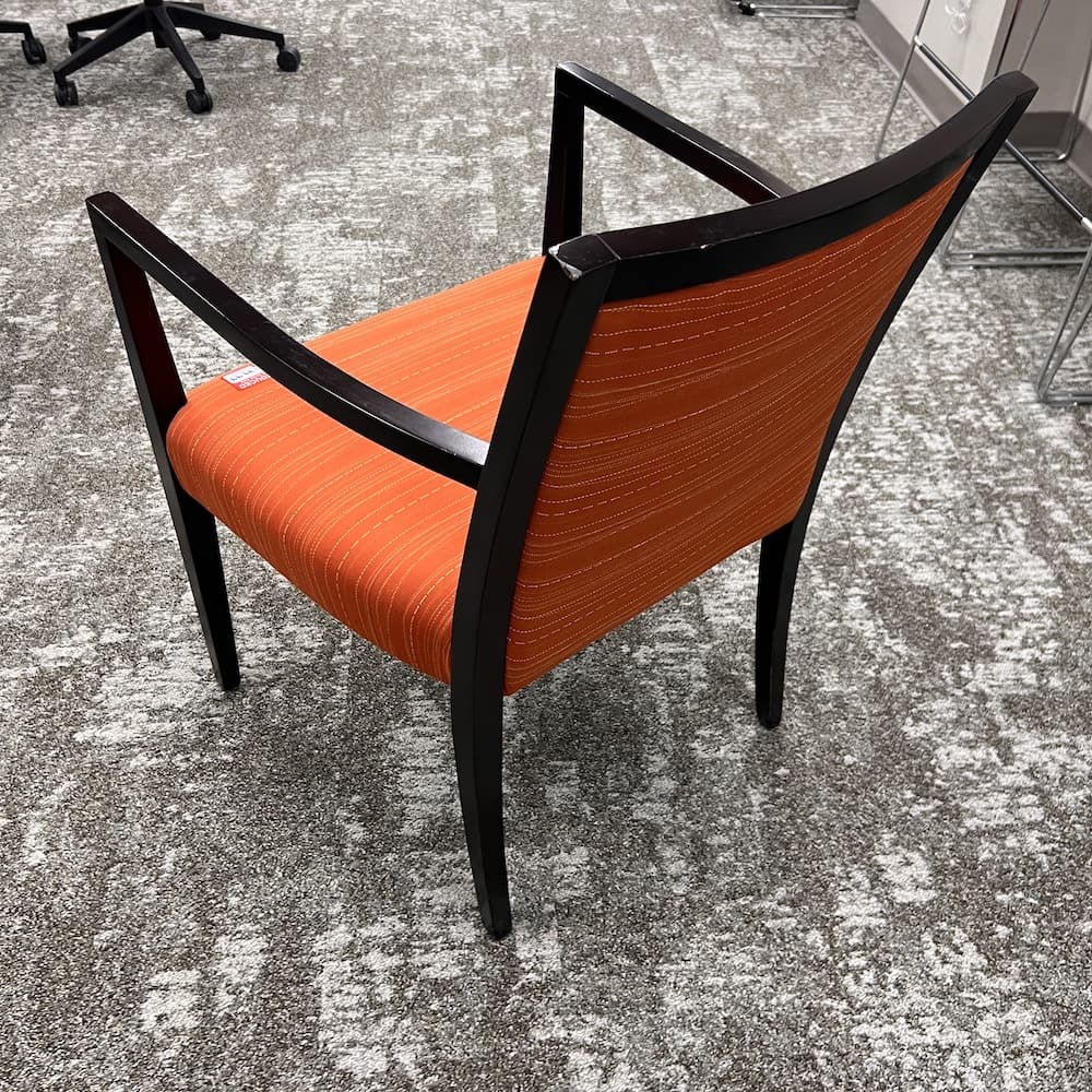 red upholstered chair with espresso veneer base frame, used office furniture, ofs