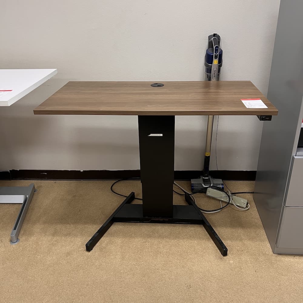 walnut laminate top height adjustable desk with black used mayline base, used office furniture