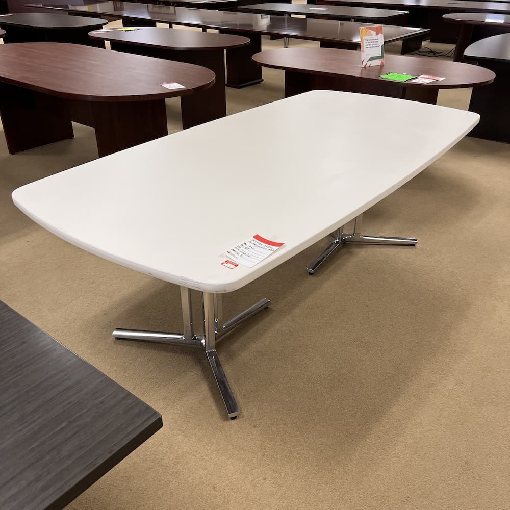 white laminate conference table. Herman Miller everyday table with chrome legs, used office furniture