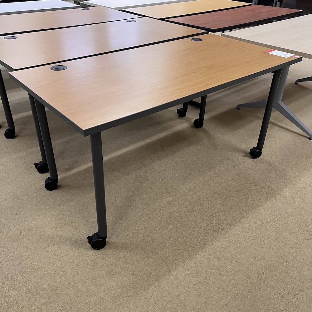 honey cherry laminate top rolling training table desk, black legs, used office furniture
