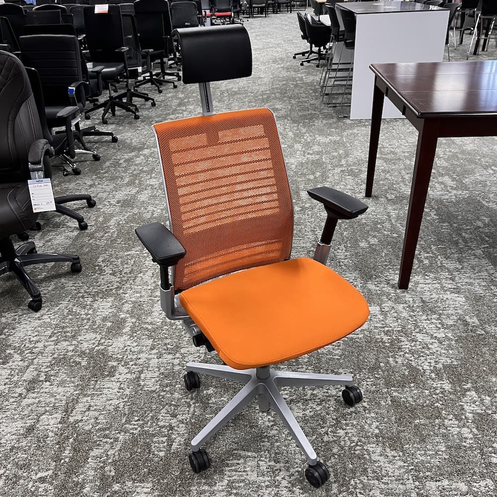 orange mesh back think v2 steelcase with head rest, ergonomic task chair, used office furniture