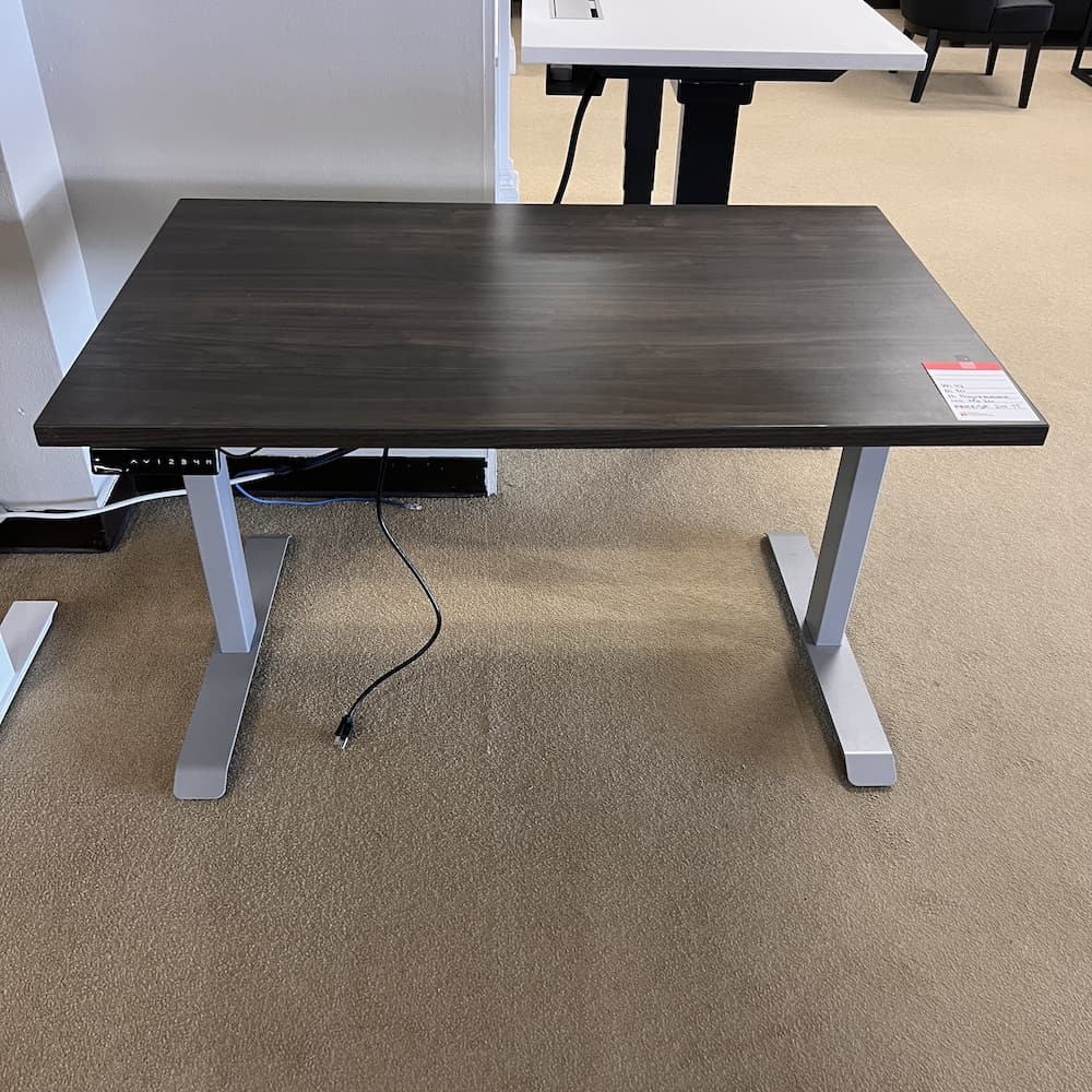 walnut laminate 48x24 electric standing desk with grey legs, used office furniture