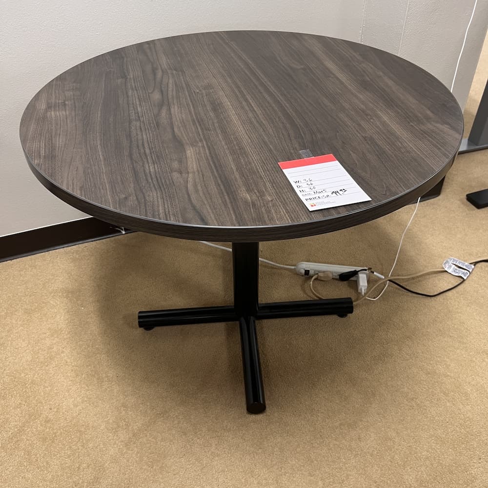 walnut laminate round break room table with black base, 36, used office furniture