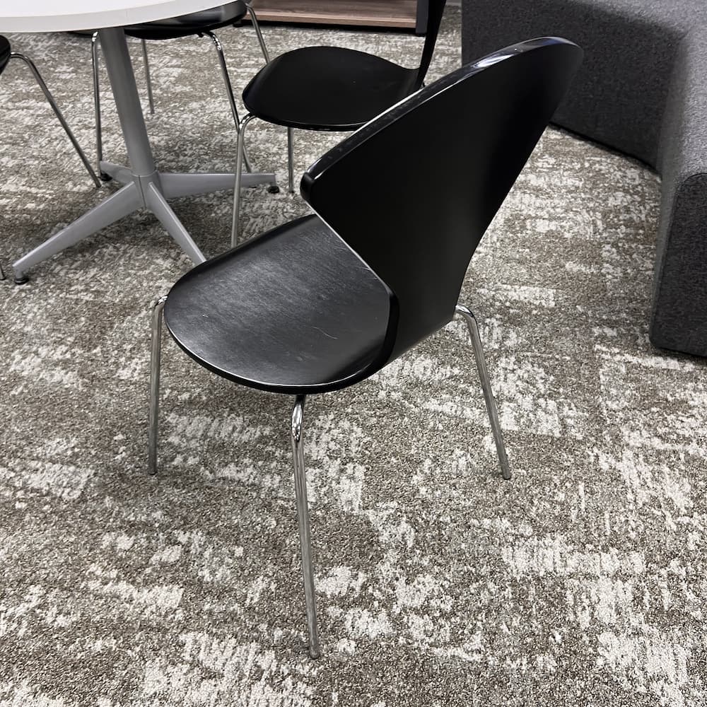 black wood formed stacking chair, fritz Hansen style, modern with chrome legs, used furniture