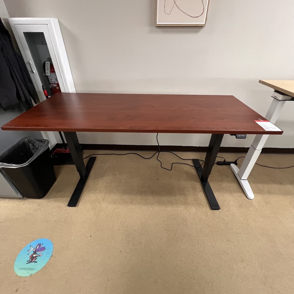 72 x 30 cherry laminate height adjustable desk with black base, used office furniture