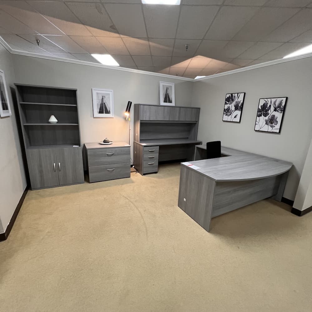 bush business furniture bow from L-desk left return with credenza, box/box/file, and 2 drawer lateral, used office furniture, grey