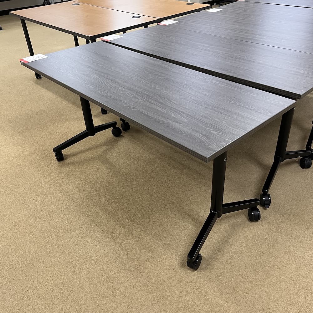 grey laminate training table, rolling black legs, open box office furniture