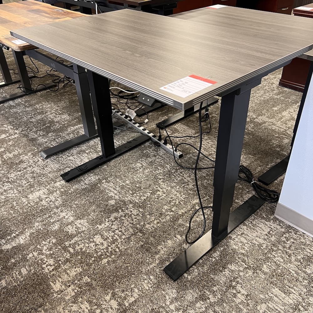 Samoa grey laminate top height adjustable desk with black base