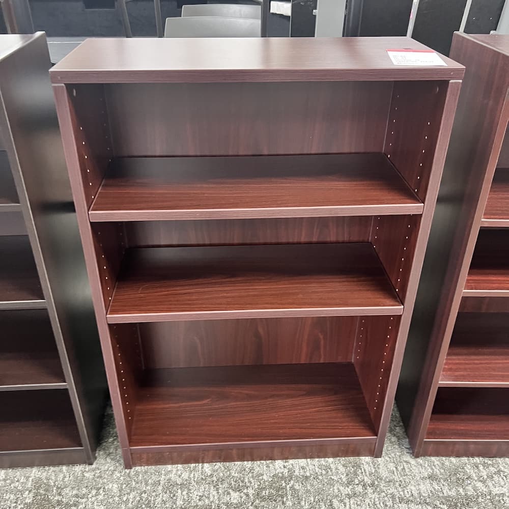 mahogany bookcase 48" tall, laminate, used office furniture