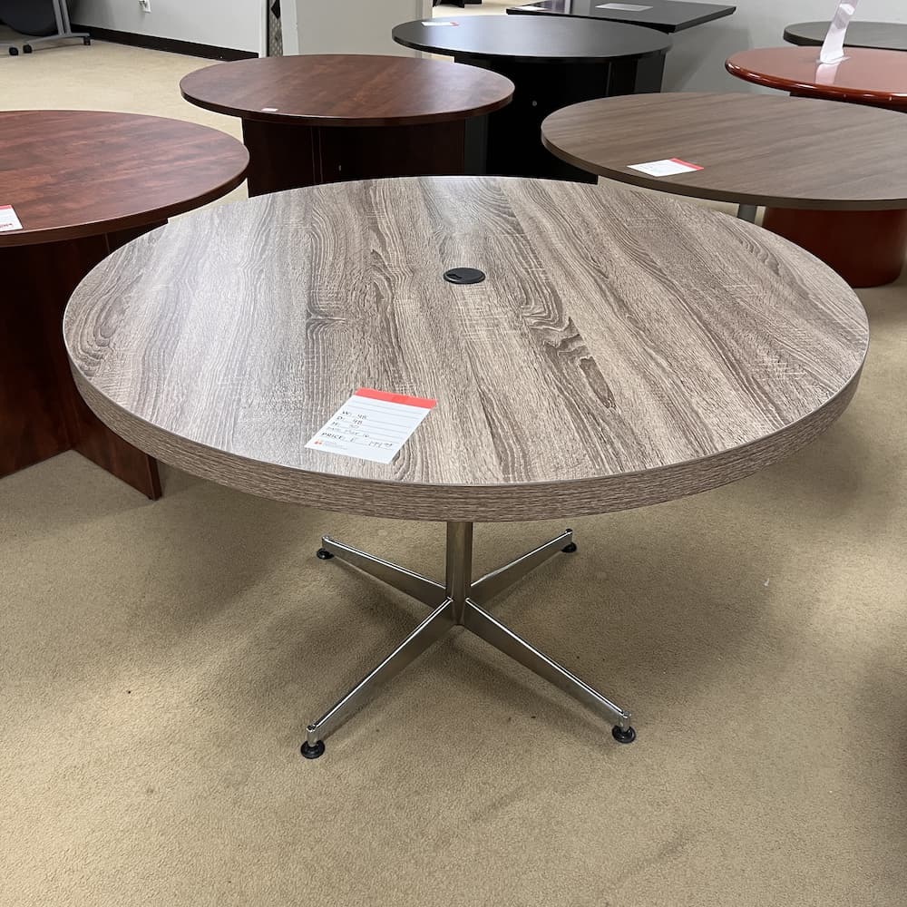 walnut laminate distressed round break room table with grey metal base, used office furniture