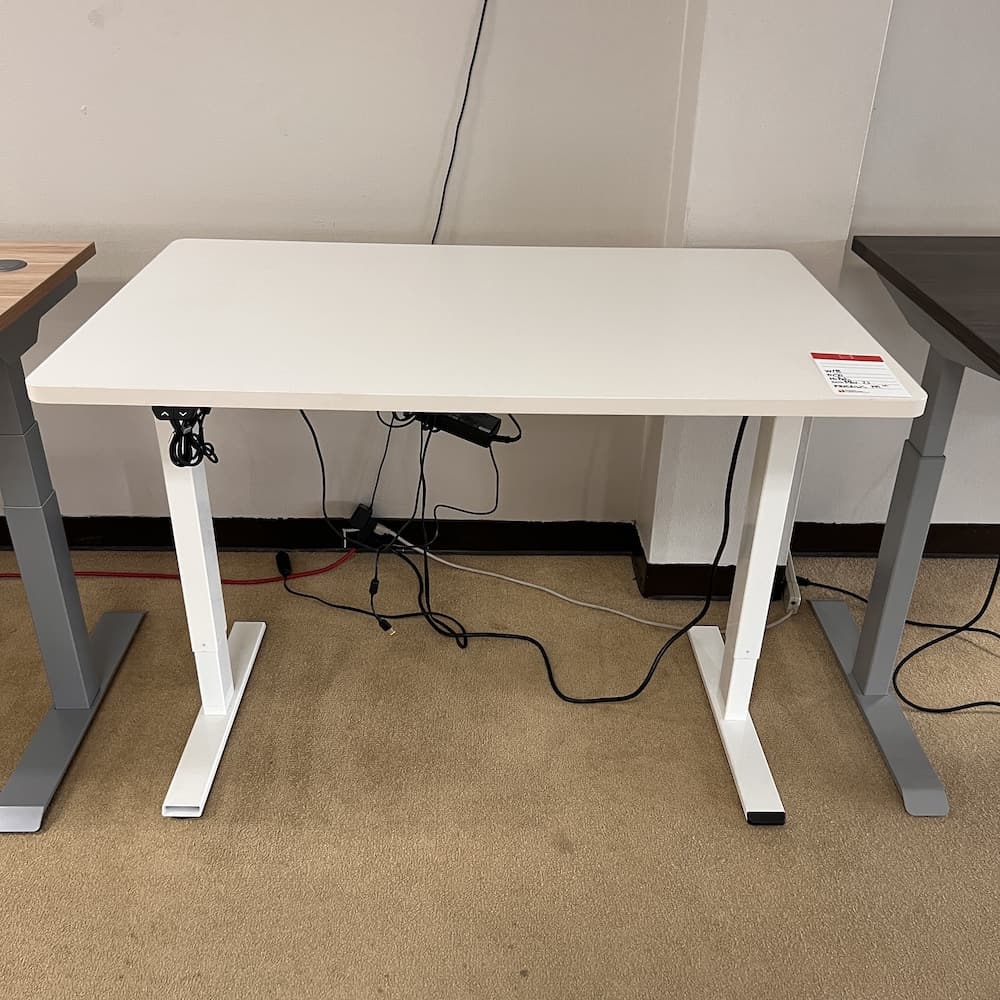 white height adjustable desk with white base 48x30, used office furniture