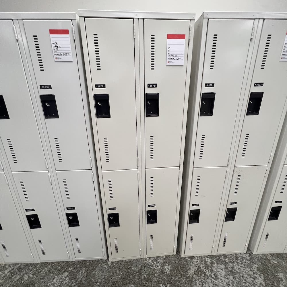 beige metal locker, 2 wide and 2 tall, used office furniture