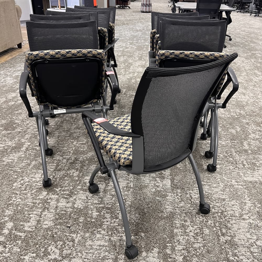 blue and tan upholstery seat, dark grey mesh back, haworth x99 nesting chair, used office furniture