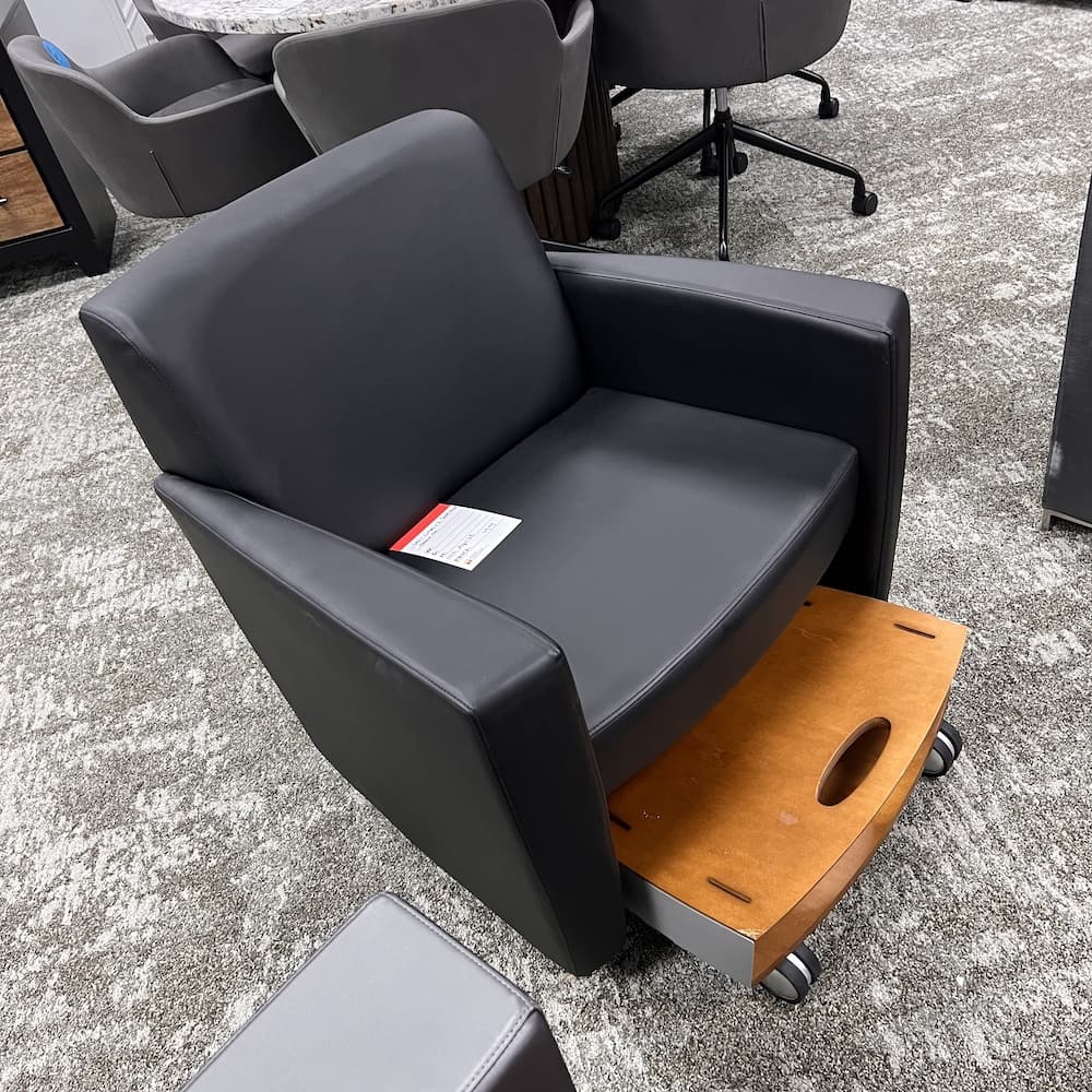 black vinyl todo lounge chair, haworth commercial contract seating, rolling footstool, used office furniture