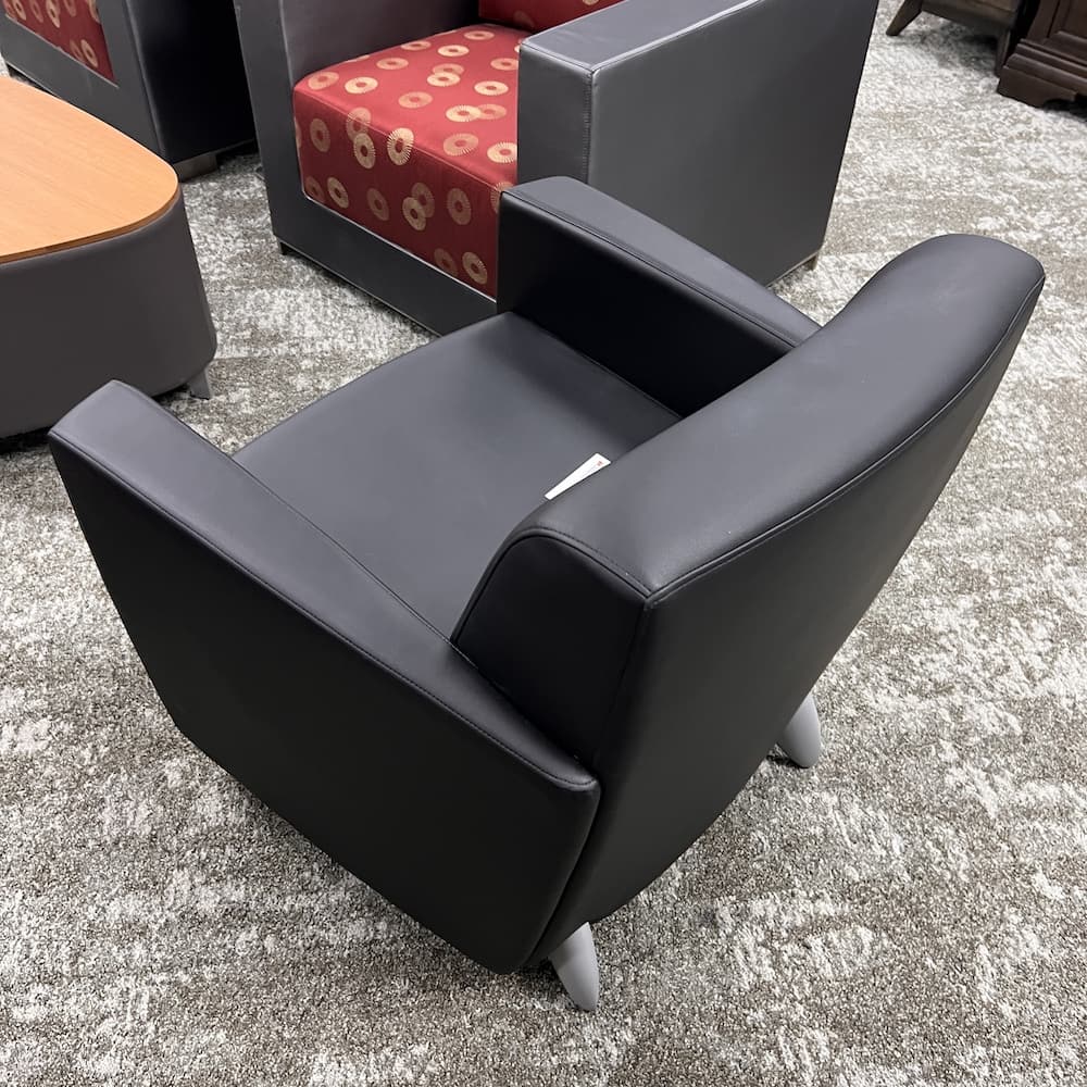 black vinyl todo lounge chair, haworth commercial contract seating, rolling footstool, used office furniture