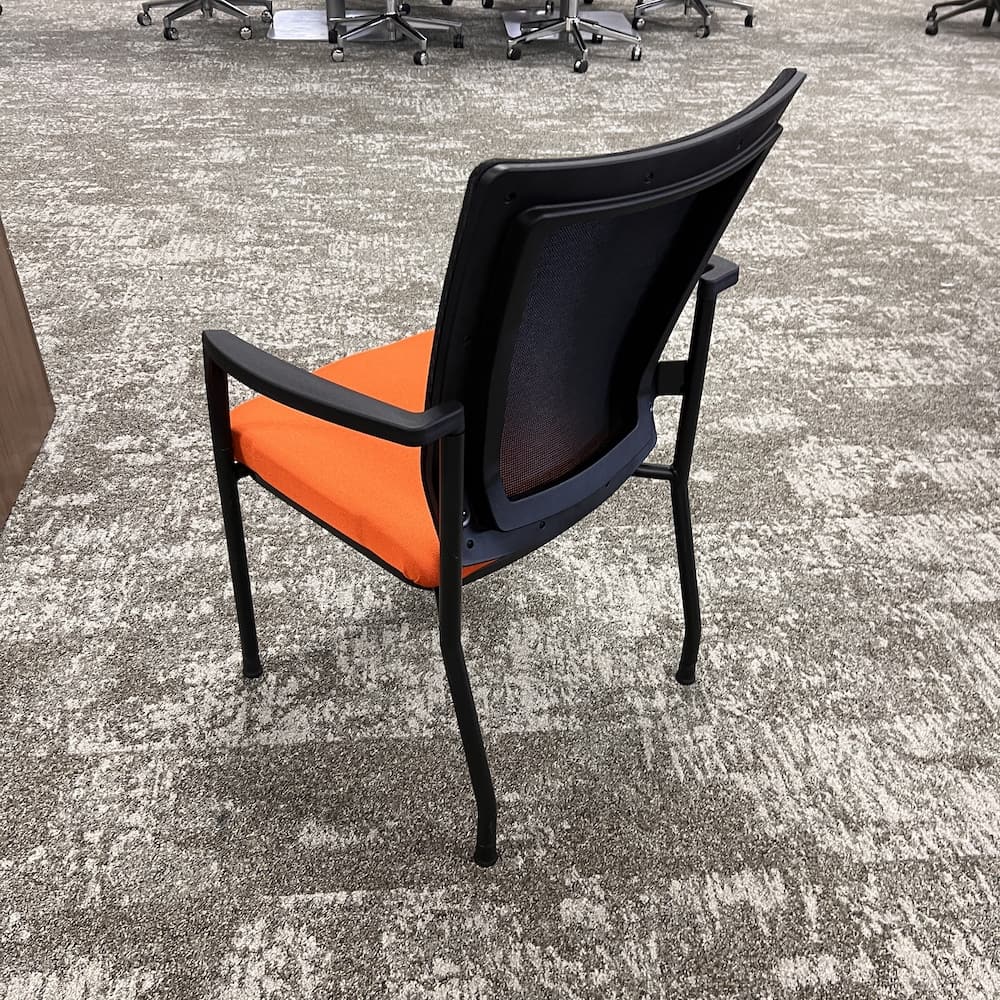 orange upholstery seat with black mesh back stacking guest chair, new closeout, office furniture