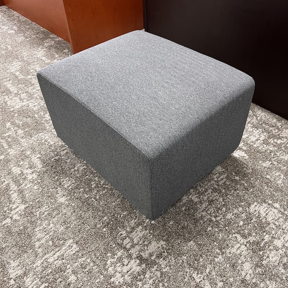 grey upholstered rectangle ottoman